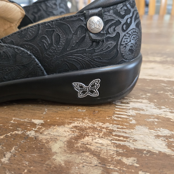 ALEGRIA Black Embossed Slip-On Shoes - Picture 5 of 10